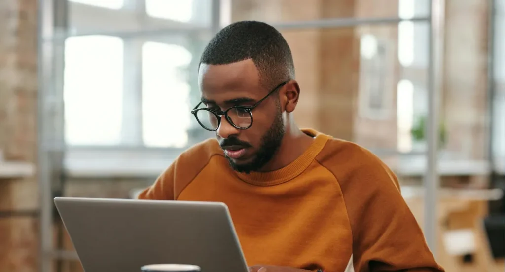 black man on laptop